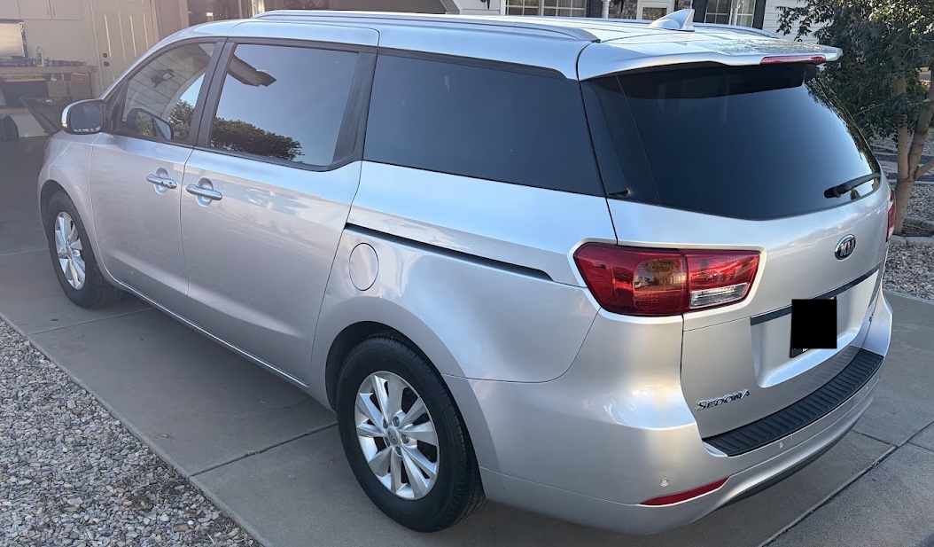 Silver minivan after a full detail